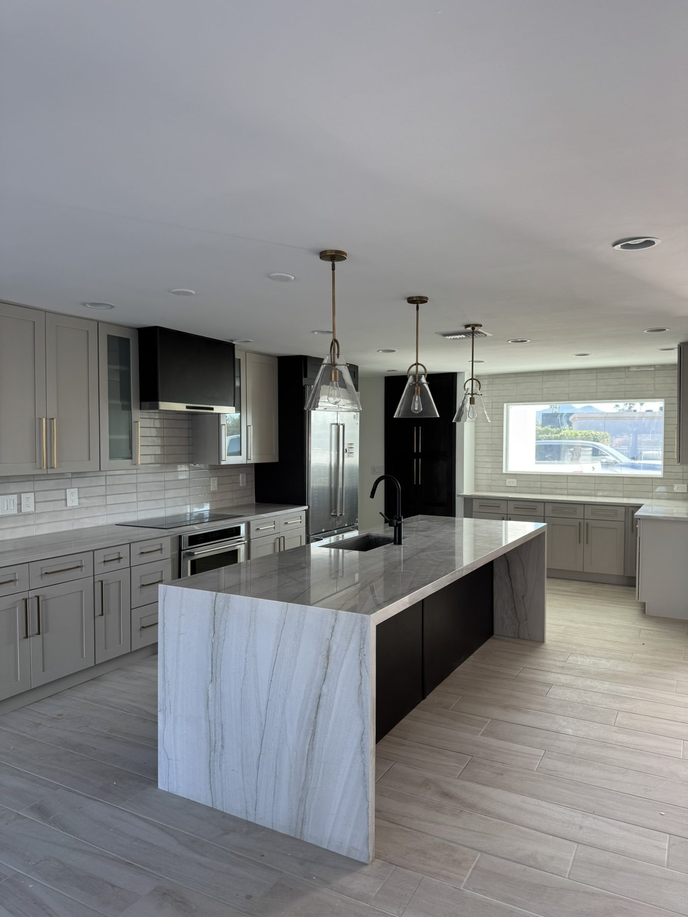 Kitchen cabinetry finished with clean crown molding detail