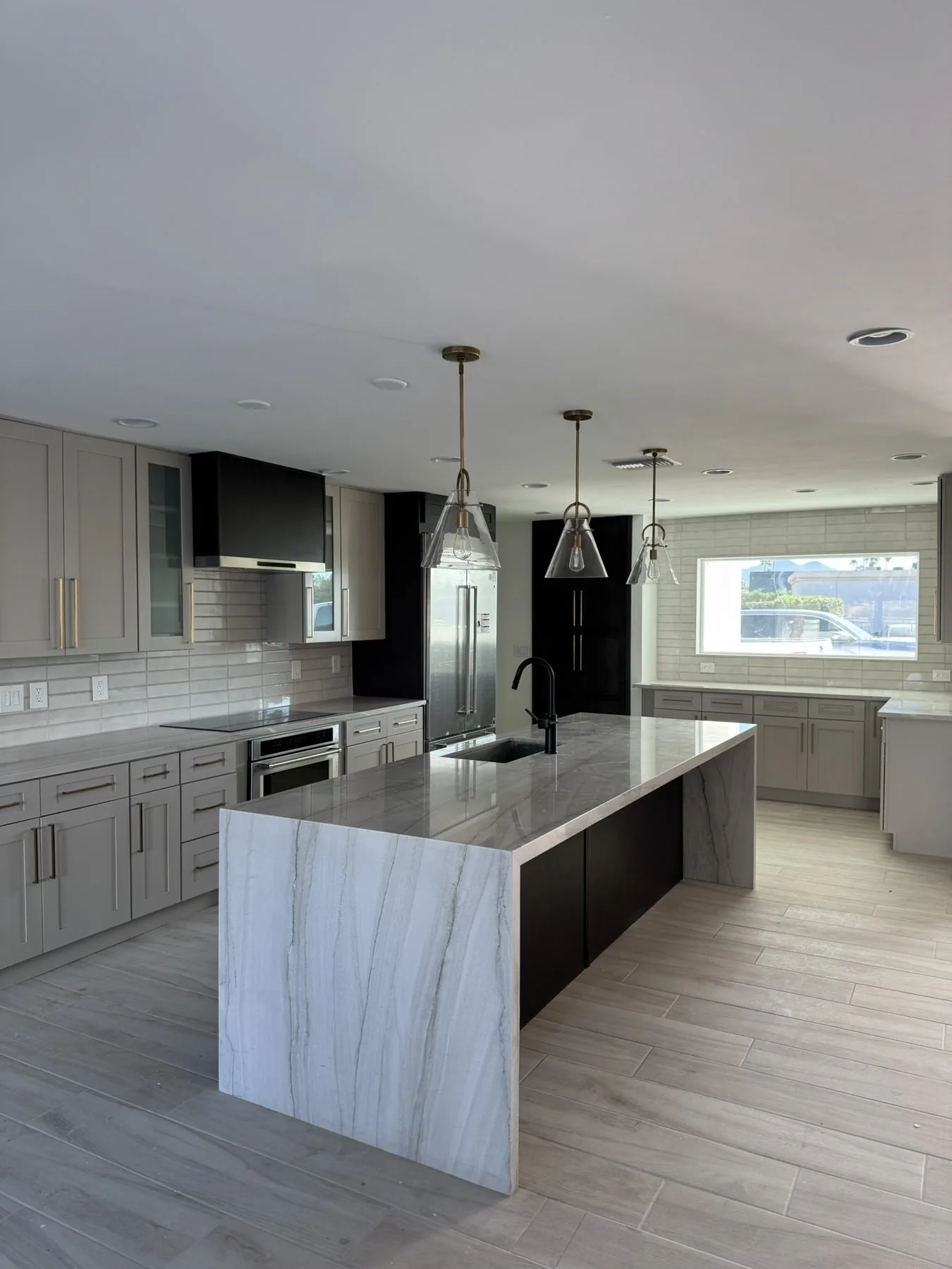 Kitchen cabinetry finished with clean crown molding detail